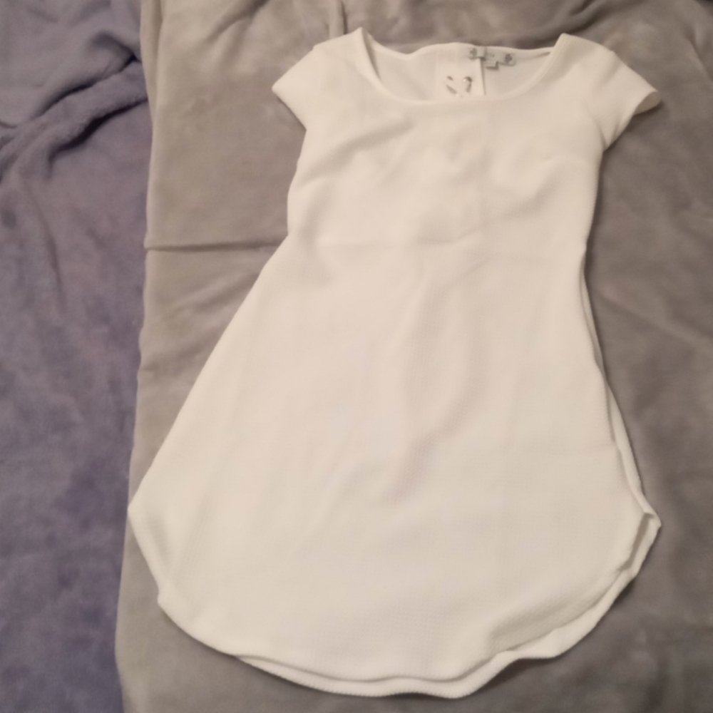 A nice white tie up dress from Urban Planet.